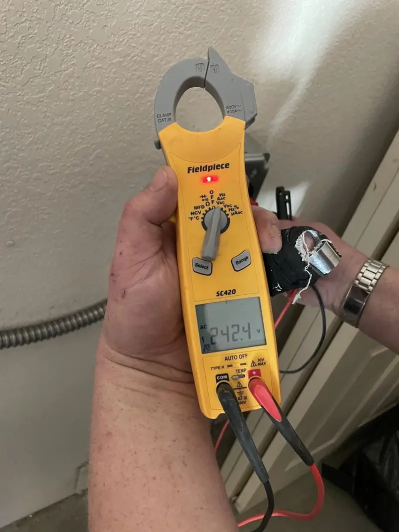 Voltage testing with clamp meter during Generator Installation in Blue Ridge